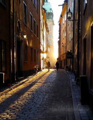 old town stockholm sunset winter shadows